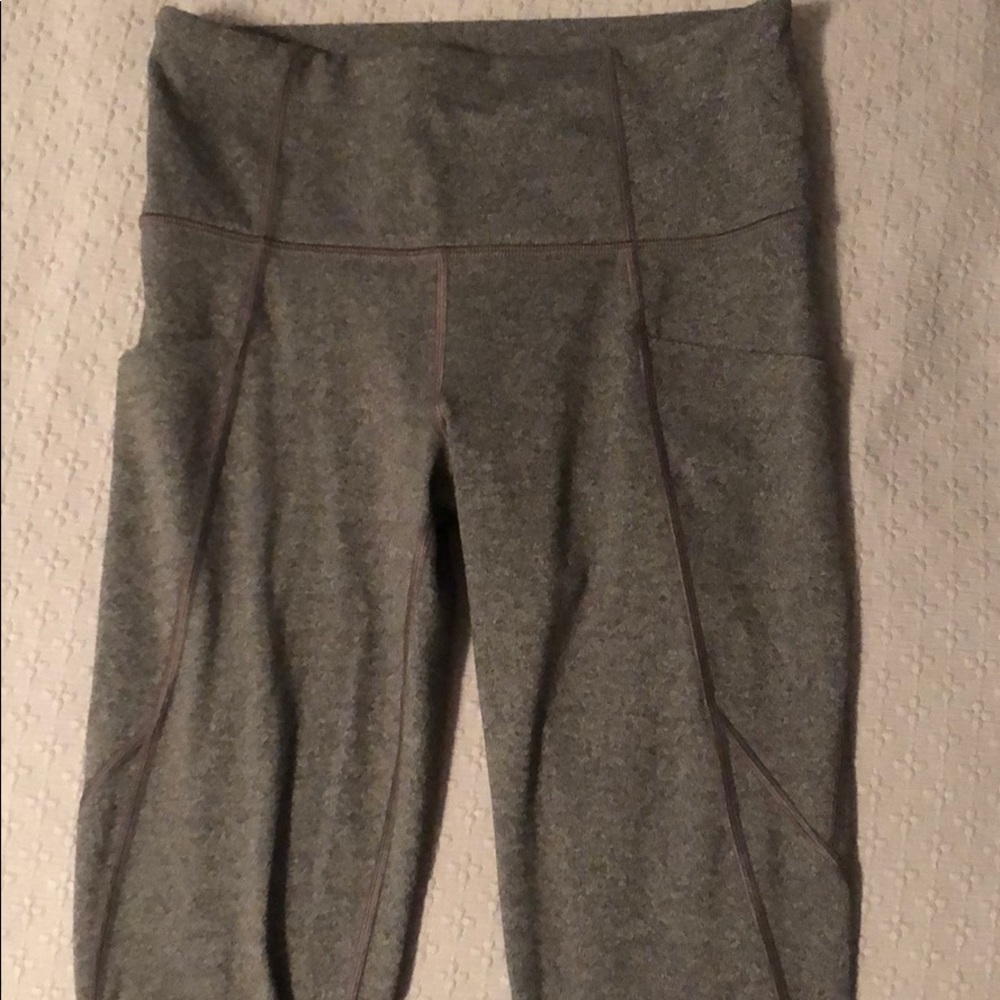 Athleta Stash Pocket salutation tight size XS